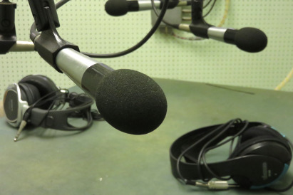 Picture showing some microphones and headphones